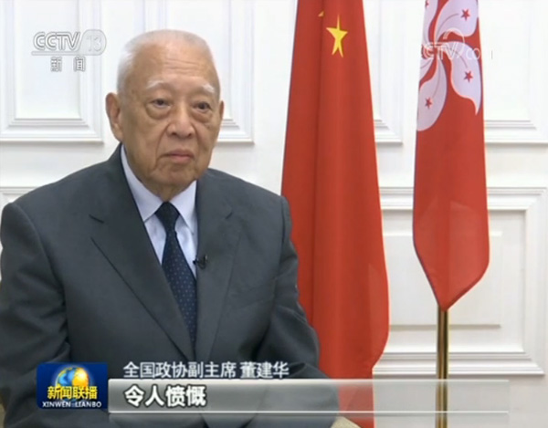 新闻联播首曝光暴徒乱港画面:污损国徽 围堵中联办